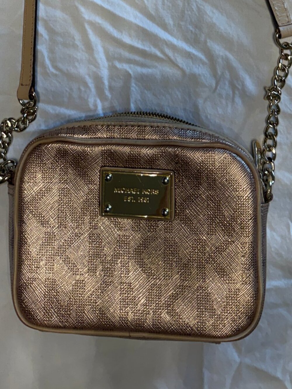 Michael Kor's rosegold evening purse